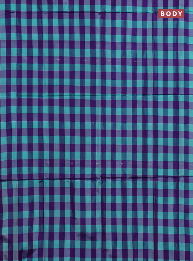 Banana pith saree teal green and violet with allover checked pattern in borderless style