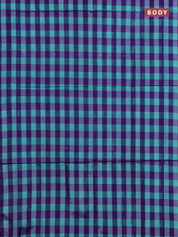Banana pith saree teal green and violet with allover checked pattern in borderless style