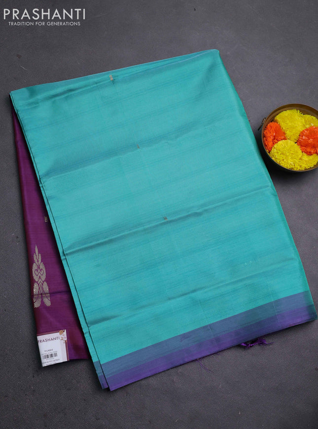 Banana pith saree teal green and purple with thread woven buttas and contrast border