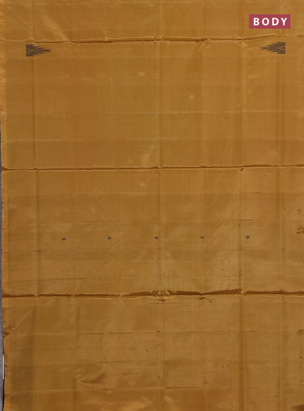 Banana pith saree mustard yellow and navy blue with thread woven buttas in borderless style