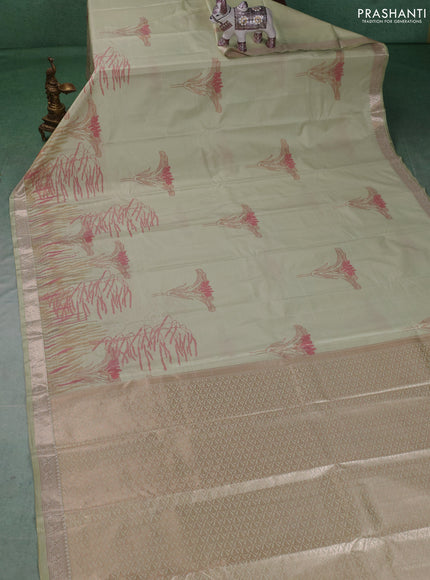 Bangalori silk saree pista green with allover ikat weaves and zari woven border