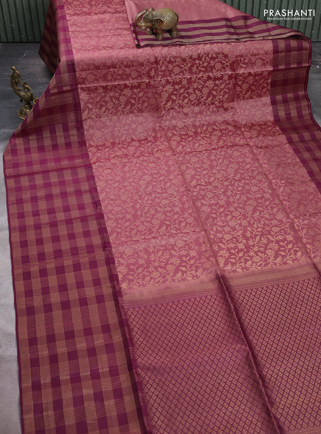 Pure soft silk saree dark peach and purple with allover zari woven brocade weaves and long zari woven checked border