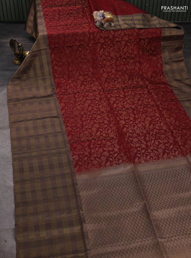 Pure soft silk saree maroon and chikku shade with allover zari woven brocade weaves and long zari woven checked border