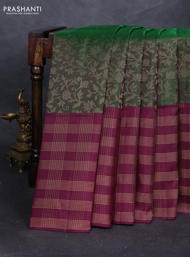 Pure soft silk saree bottle green and purple with allover zari woven brocade weaves and long zari woven checked border