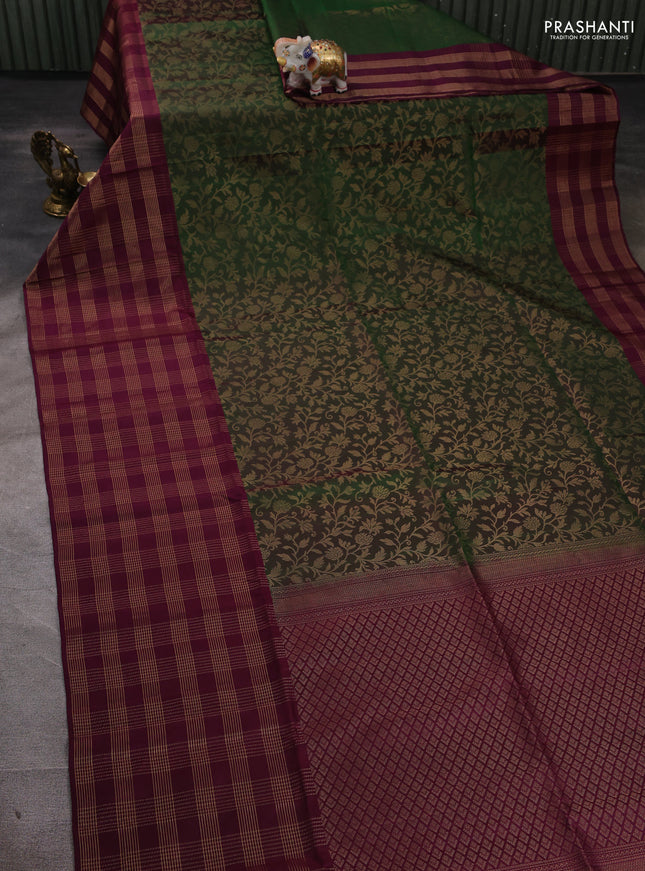 Pure soft silk saree bottle green and purple with allover zari woven brocade weaves and long zari woven checked border