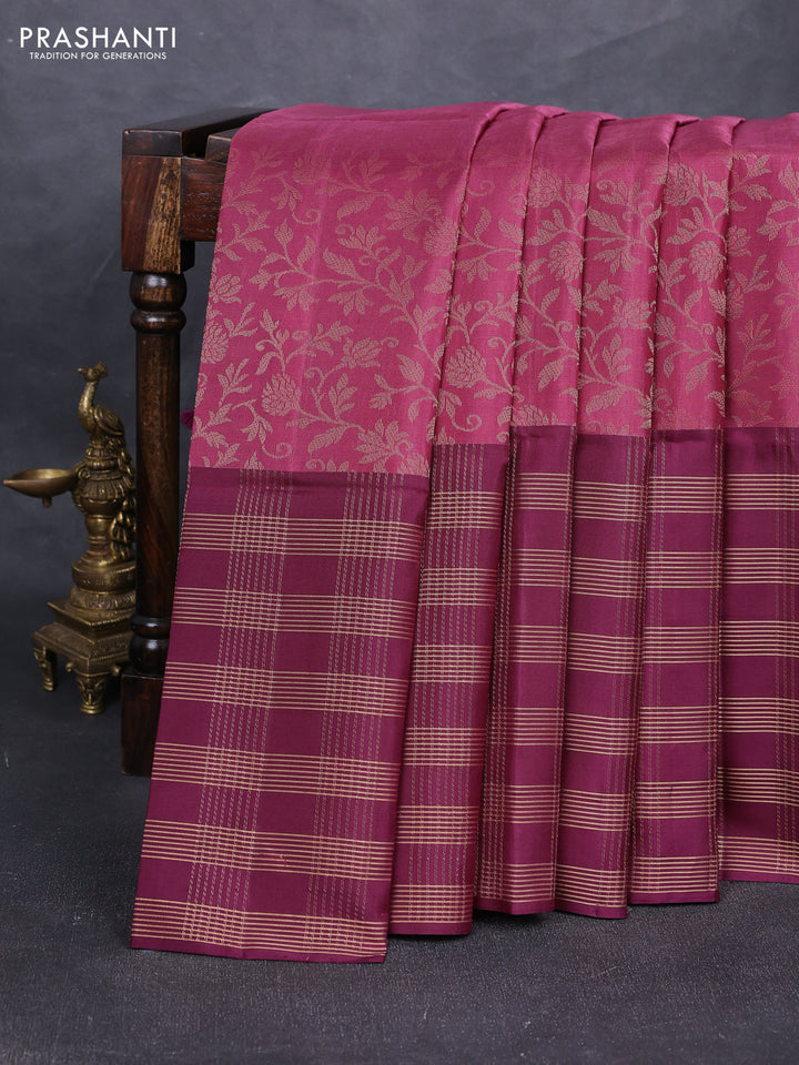 Pure soft silk saree dark mauve pink and wine shade with allover zari woven brocade weaves and long zari woven checked border