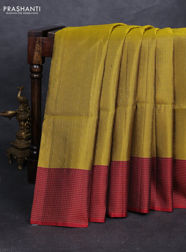 Pure soft silk saree mehendi green and maroon with allover zari woven brocade weaves and zari woven checked border