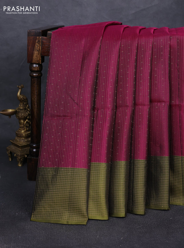Pure soft silk saree wine shade and olive green with allover zari woven brocade weaves and zari woven checked border