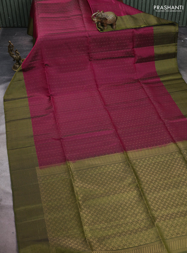 Pure soft silk saree wine shade and olive green with allover zari woven brocade weaves and zari woven checked border