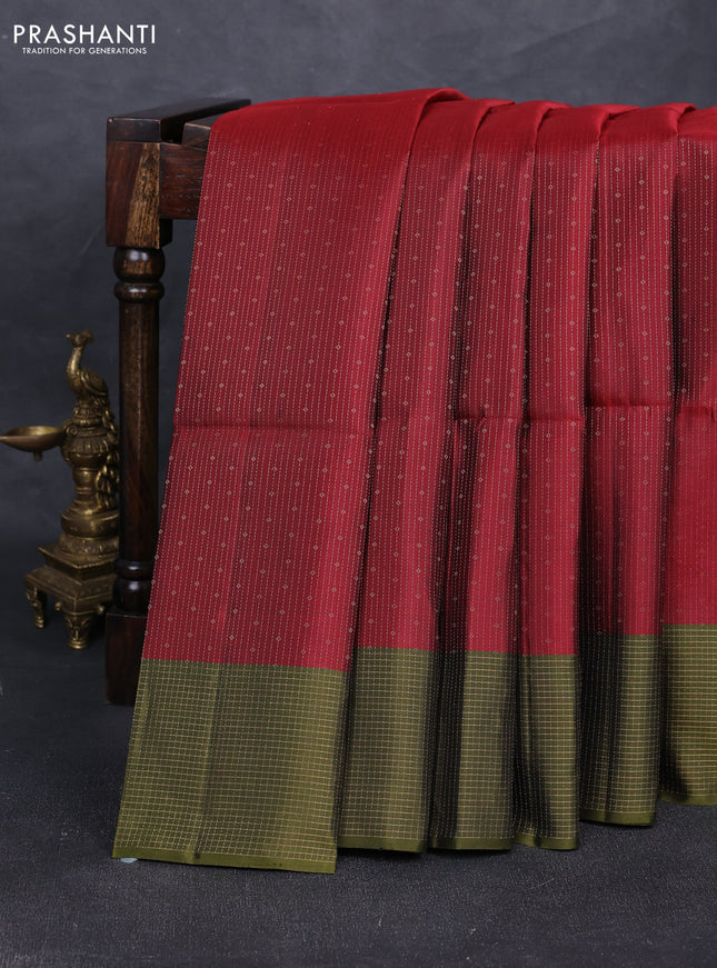 Pure soft silk saree maroon and olive green with allover zari woven brocade weaves and zari woven checked border