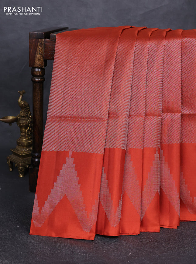 Pure soft silk saree rust shade with allover silver zari woven brocade weaves and temple design silver zari woven border