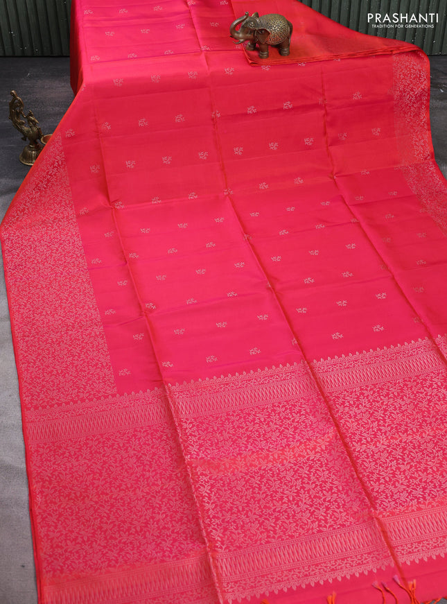 Pure soft silk saree dual shade of pinkish orange with silver zari woven buttas and silver zari woven border