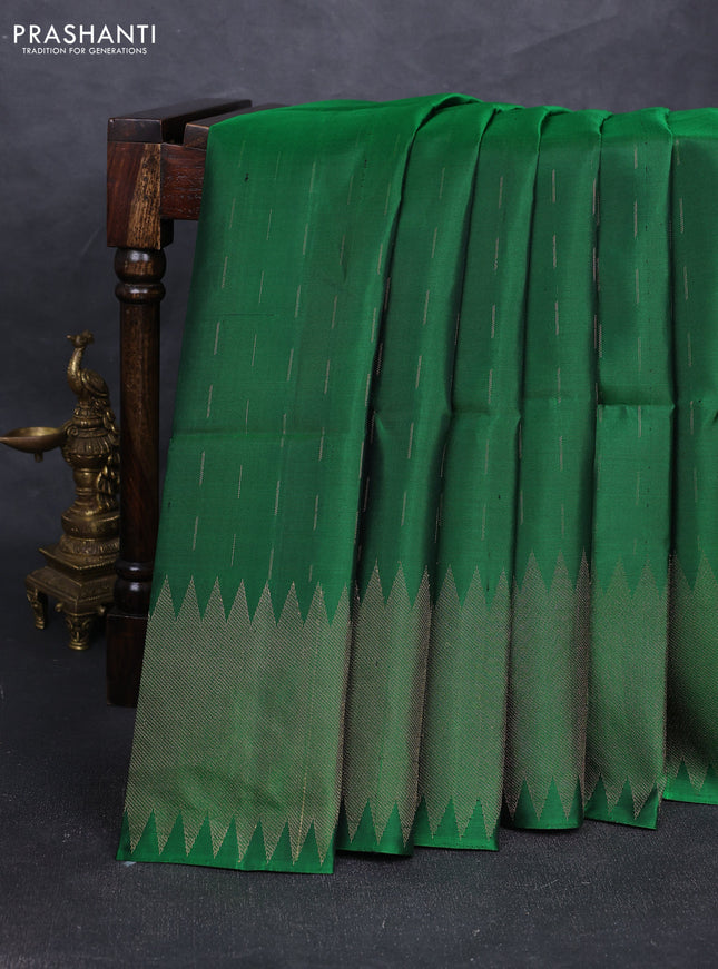 Pure soft silk saree green with allover zari woven buttas and zari woven border