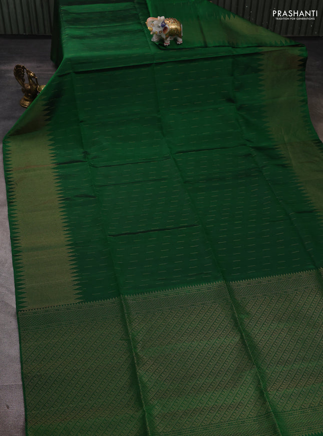 Pure soft silk saree green with allover zari woven buttas and zari woven border