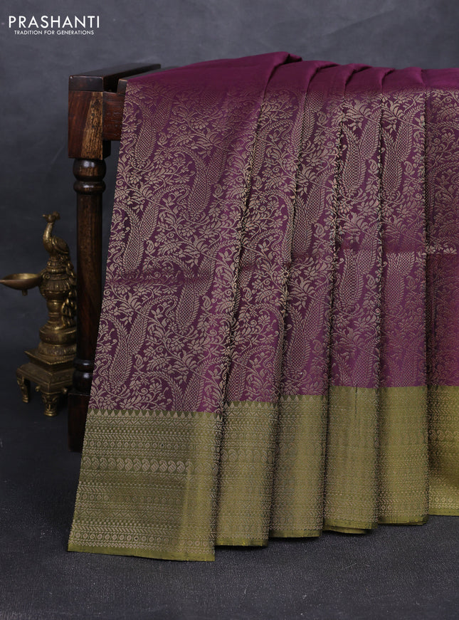 Pure soft silk saree wine shad and mehendi green with allover zari woven brocade weaves and zari woven border