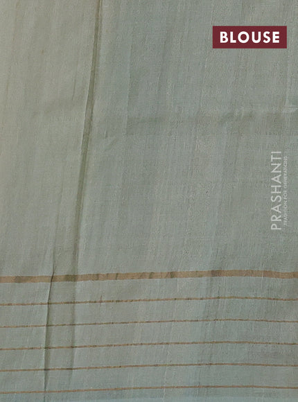 Pure tussar silk saree mild teal and off white with allover floral prints and zari woven checked border