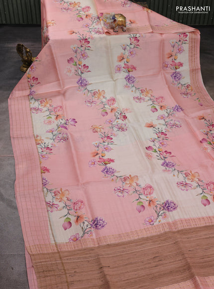 Pure tussar silk saree peach shade and cream with allover floral prints and zari woven checked border