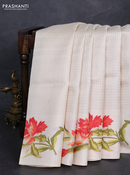 Pure tussar silk saree cream with allover zari woven butta weaves and floral printed border