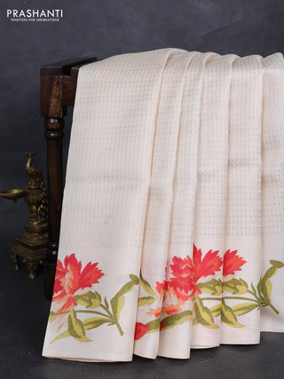 Pure tussar silk saree cream with allover zari woven butta weaves and floral printed border