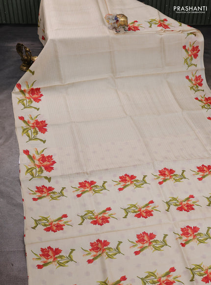 Pure tussar silk saree cream with allover zari woven butta weaves and floral printed border