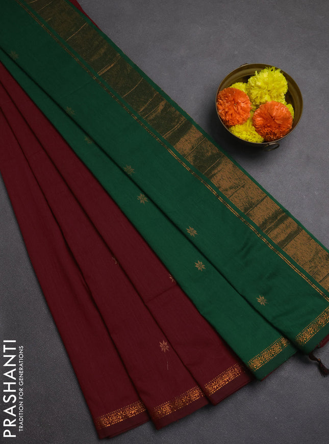Semi maheswai cotton saree maroon and dark green with allover zari woven buttas and small copper zari woven border