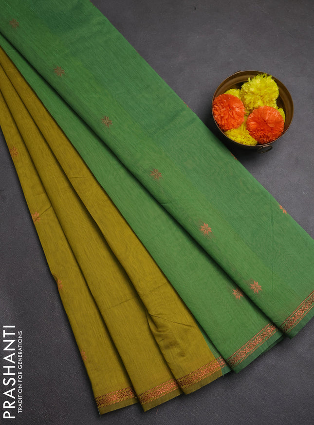 Semi maheswai cotton saree dark mustard and green with allover zari woven buttas and small zari woven border