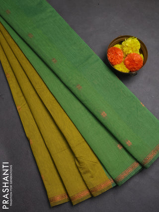 Semi maheswai cotton saree dark mustard and green with allover zari woven buttas and small zari woven border
