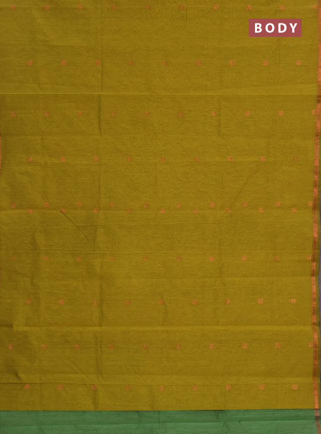 Semi maheswai cotton saree dark mustard and green with allover zari woven buttas and small zari woven border