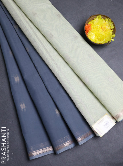 Semi maheswai cotton saree grey and mild pista green with allover zari woven buttas and small zari woven border