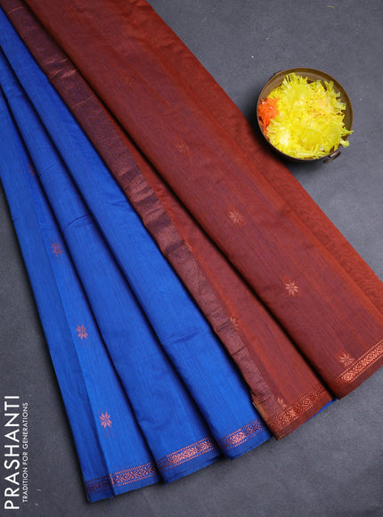 Semi maheswai cotton saree blue and rust shade with allover copper zari woven buttas and copper zari woven border