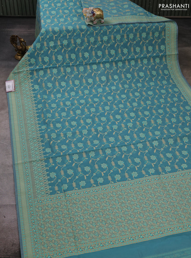 Banarasi cotton saree teal blue with allover thread weaves and woven border