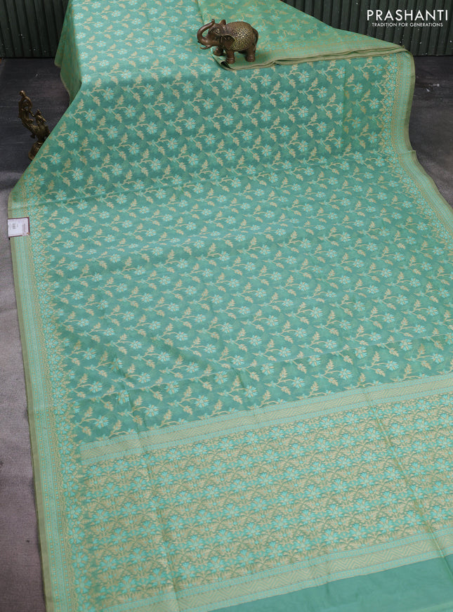 Banarasi cotton saree teal green with allover thread weaves and woven border