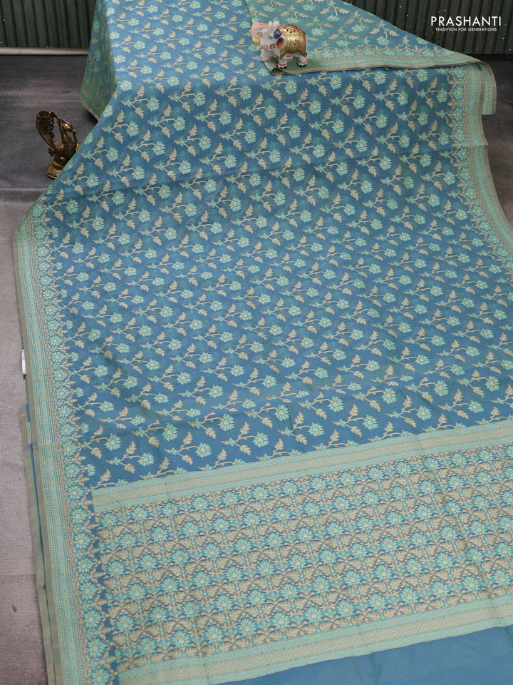 Banarasi cotton saree dual shade of teal blue with allover thread weaves and woven border