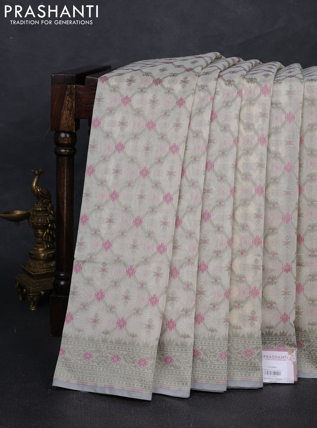 Banarasi cotton saree cream and pastel green with allover thread weaves and woven border