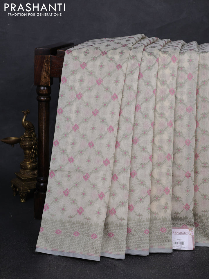 Banarasi cotton saree cream and pastel green with allover thread weaves and woven border