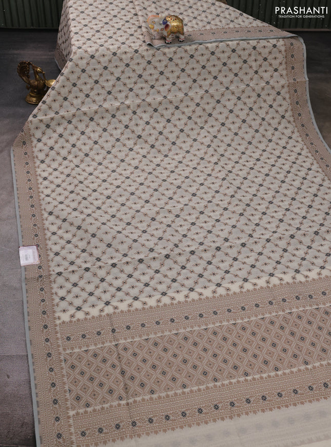 Banarasi cotton saree cream and brown with allover thread weaves and woven border