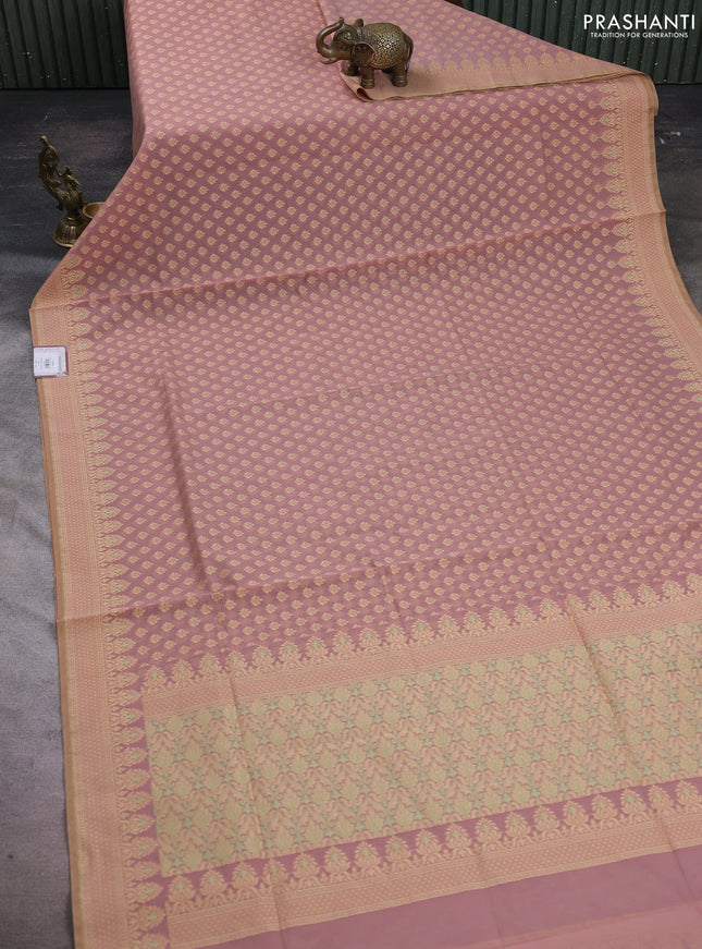 Banarasi cotton saree peach shade with thread woven butta weaves and woven border