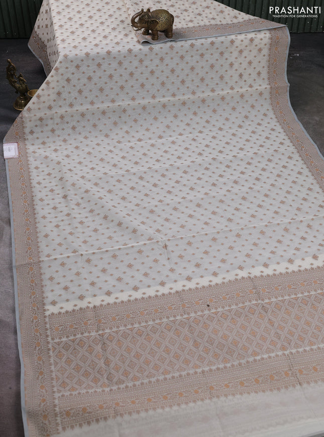 Banarasi cotton saree off white and brown with thread woven butta weaves and woven border