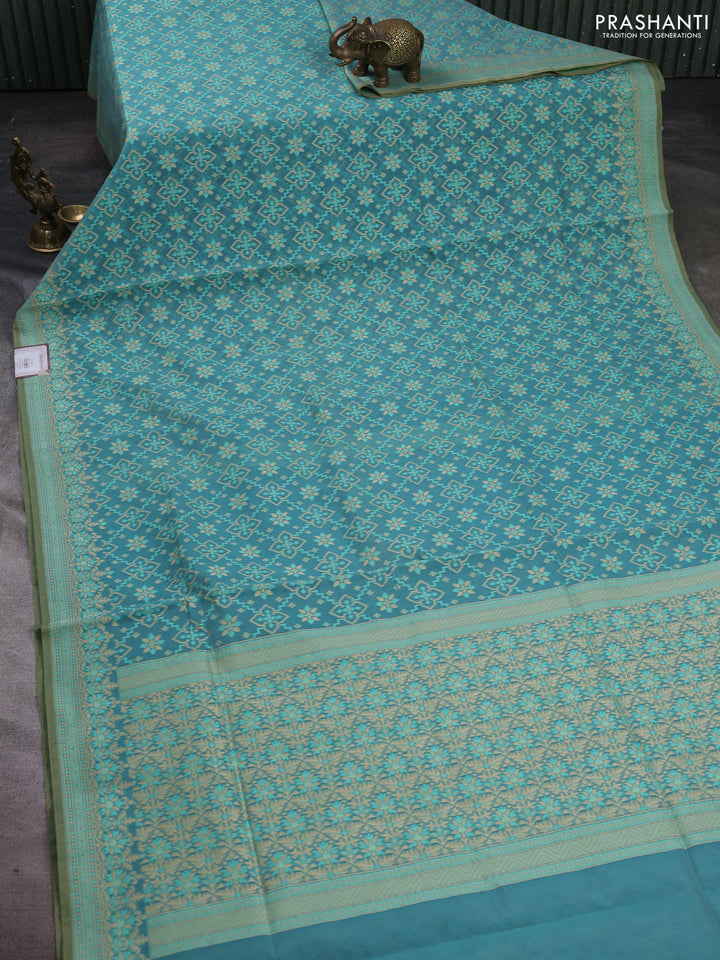 Banarasi cotton saree teal green shade with allover thread weaves and woven border