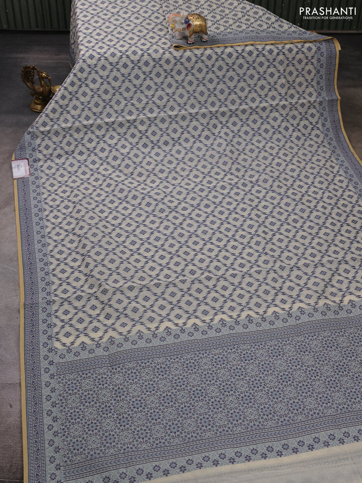 Banarasi cotton saree off white and navy blue with allover thread weaves and woven border