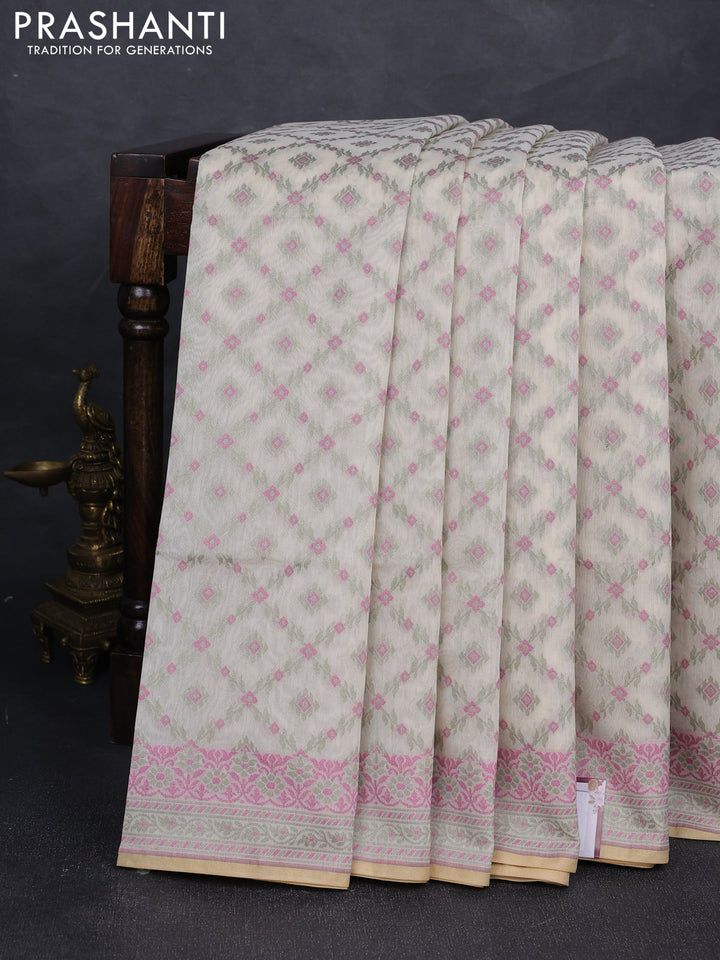 Banarasi cotton saree off white and pista green with allover thread weaves and woven border