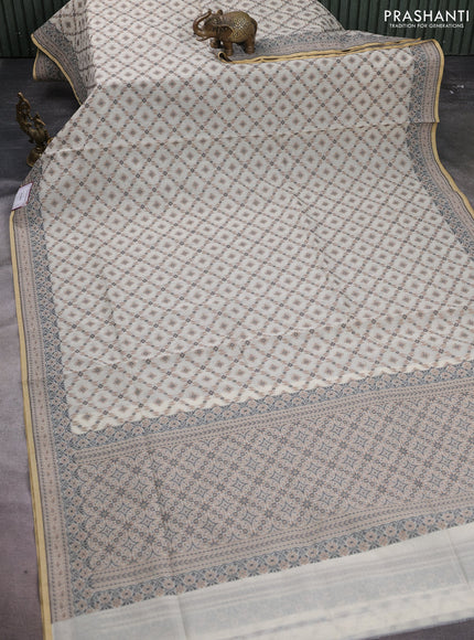 Banarasi cotton saree off white and brown with allover thread weaves and woven border