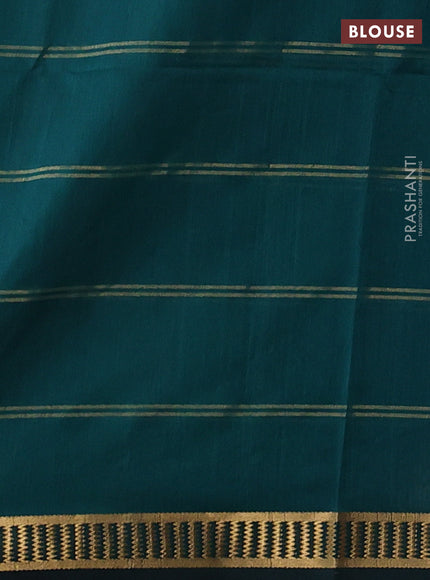 Maheshwari silk cotton saree peacock green with allover zari checked pattern and zari woven border