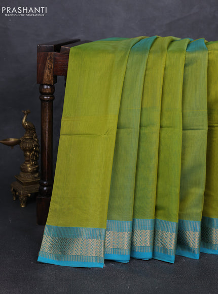 Maheshwari silk cotton saree light green and teal blue with plain body and zari woven border