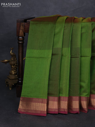 Maheshwari silk cotton saree mehendi green and pink with plain body and ganga jamuna border