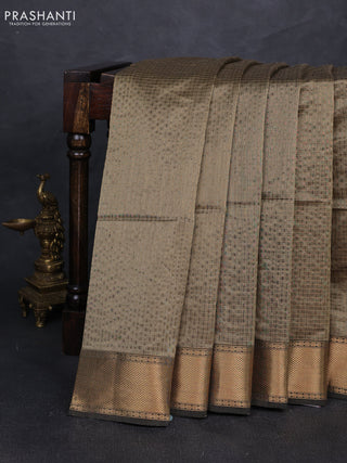 Maheshwari silk cotton saree pastel green with allover small zari checked pattern and zari woven border