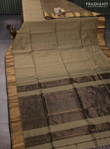 Maheshwari silk cotton saree pastel green with allover small zari checked pattern and zari woven border
