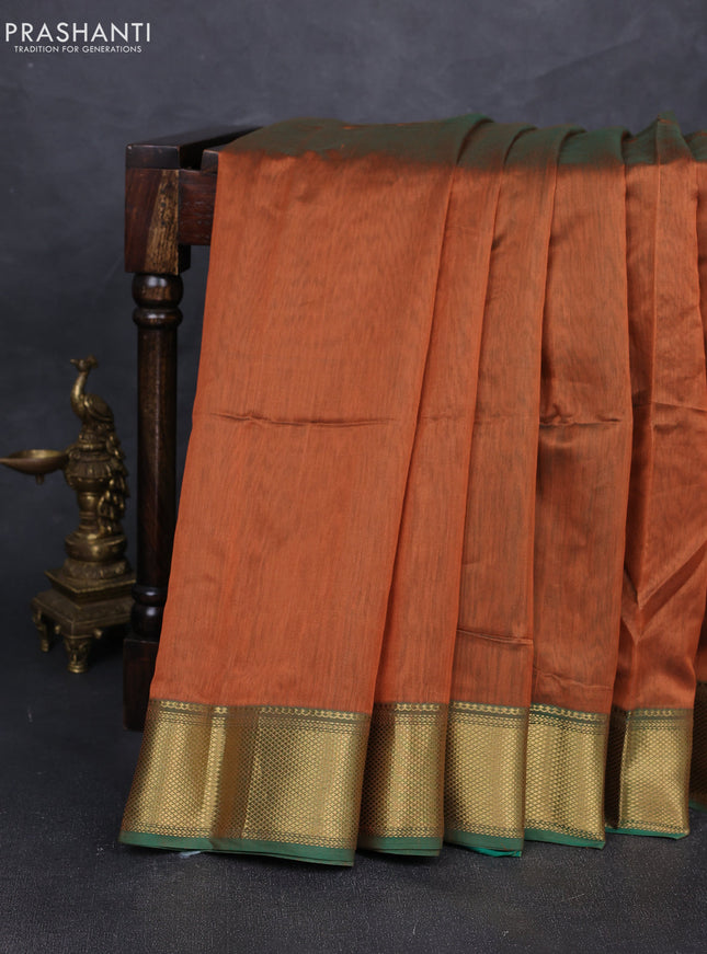Maheshwari silk cotton saree rust shade and green with plain body and zari woven border