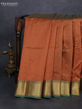 Maheshwari silk cotton saree rust shade and green with plain body and zari woven border