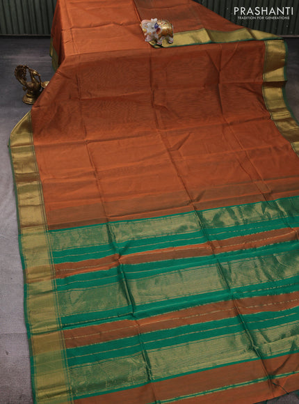 Maheshwari silk cotton saree rust shade and green with plain body and zari woven border